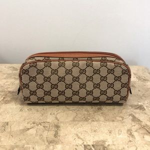 Gucci gg supreme logo pouch
